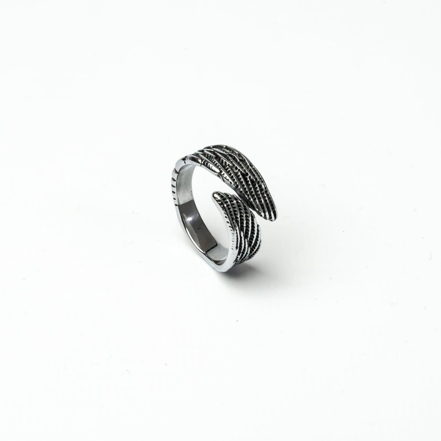 Symbolic wing ring representing freedom and strength