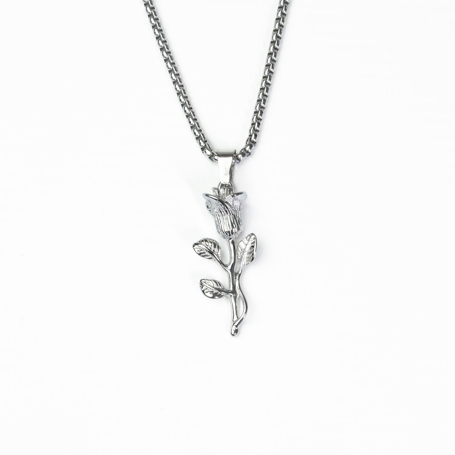 Silver rose pendant with detailed blooming rose design in stainless steel