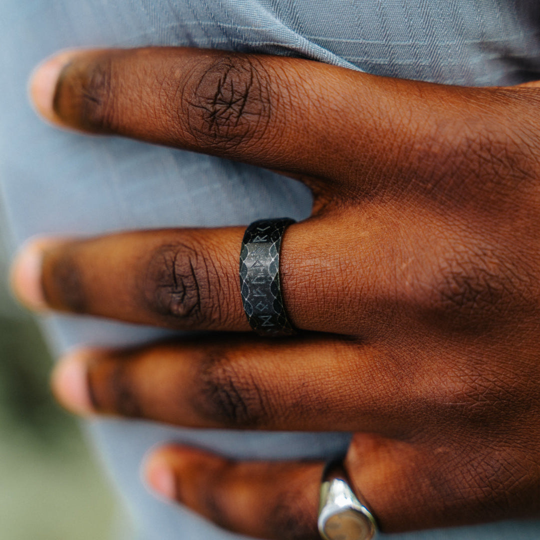 Men's black band ring