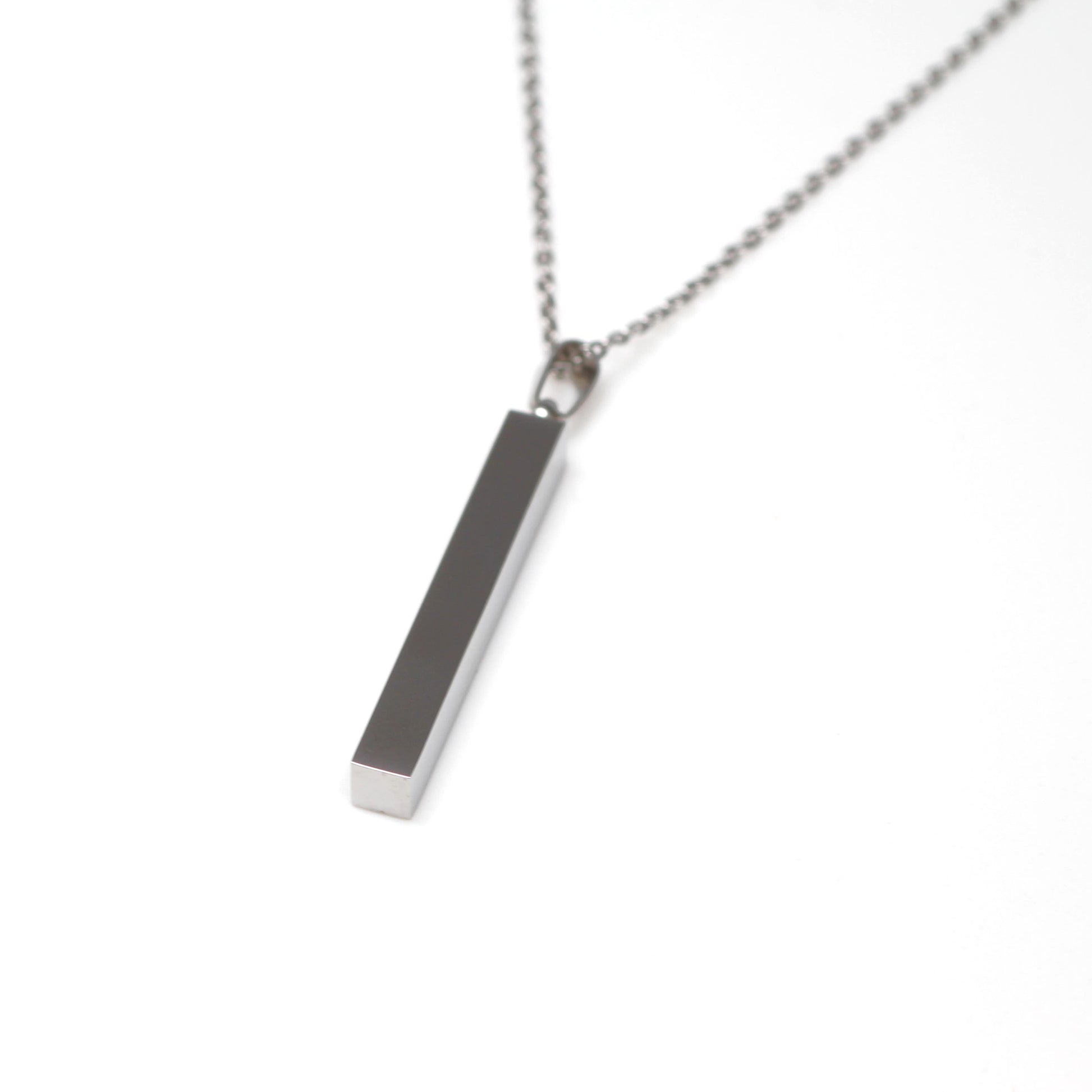 Necklace with a rectangular pendant on a white background