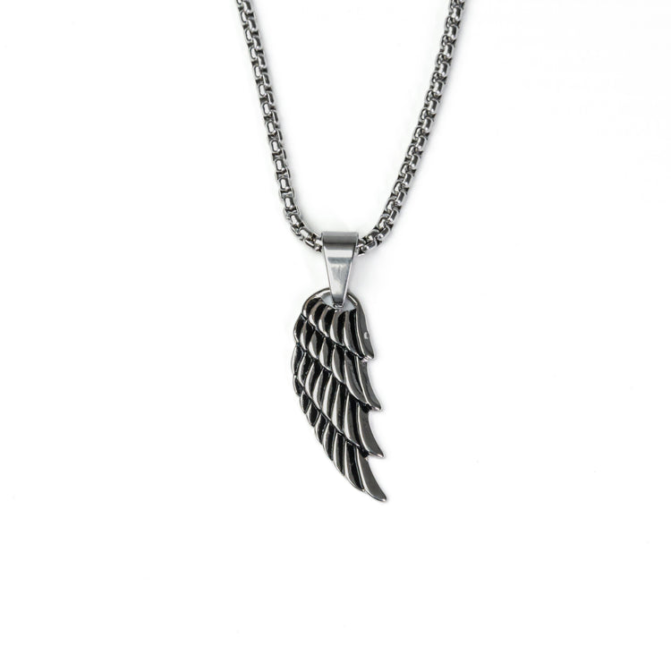 Silver wing pendant with detailed feather design in stainless steel