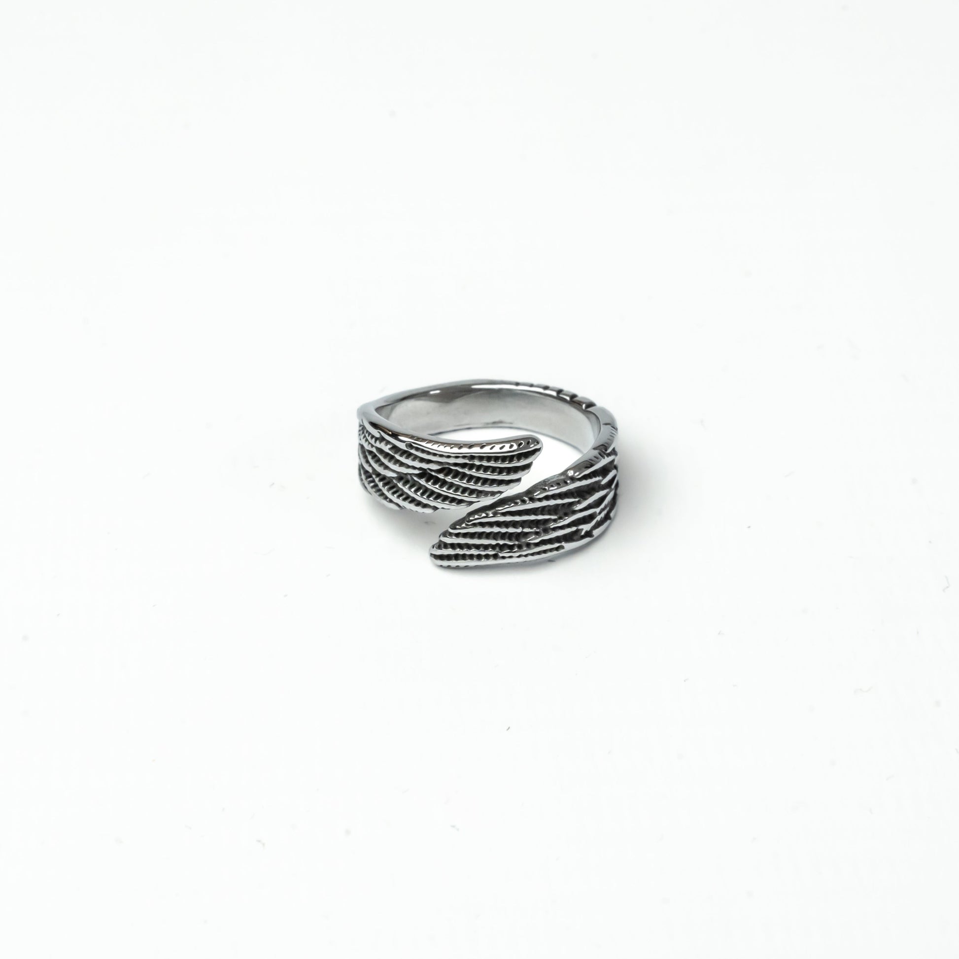 Silver-tone wing ring crafted from durable stainless steel, perfect for everyday wear.